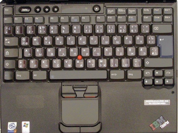 German-Russian laminated keyboard stickers. German letters in white and Russian letters in blue.